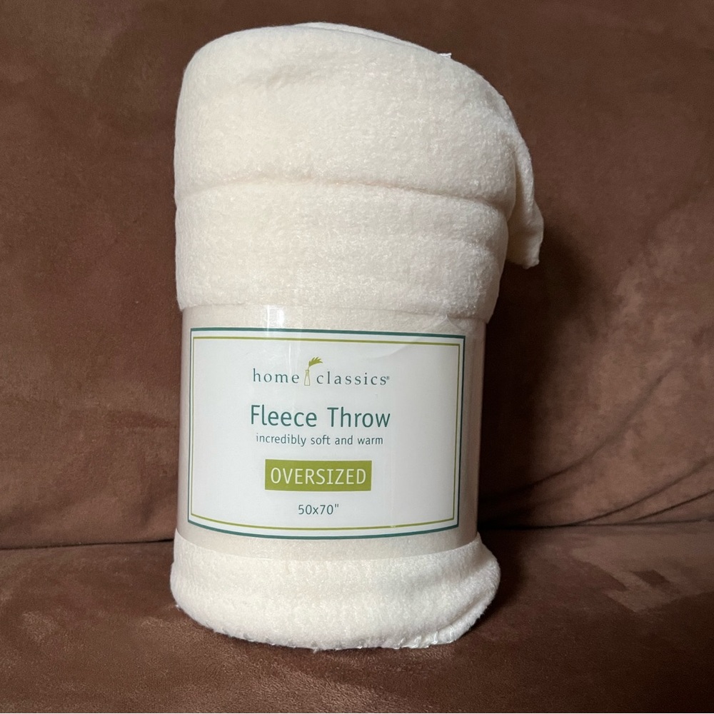 HOME CLASSICS Oversized Fleece Throw 50"X 70” Ivory.  NEW